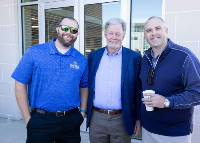 Three Men smiling at the camera